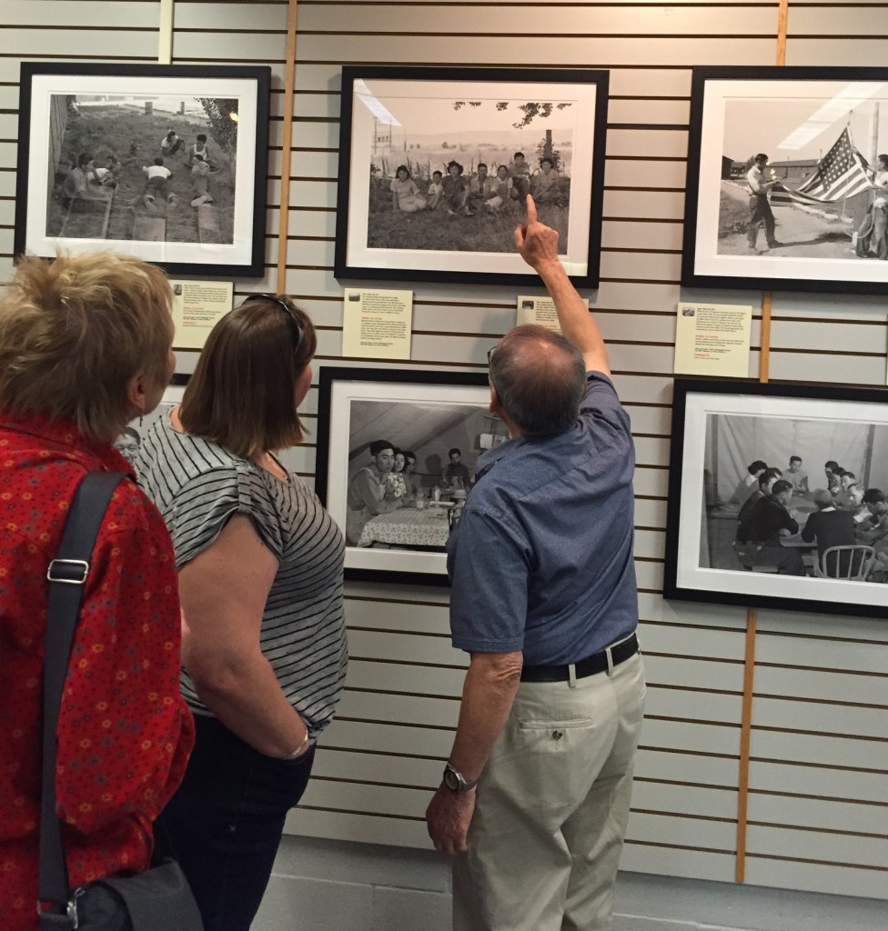 Mathias Uchiyama points out his family members to museum visitors. Image courtesy of Susan Nagai.